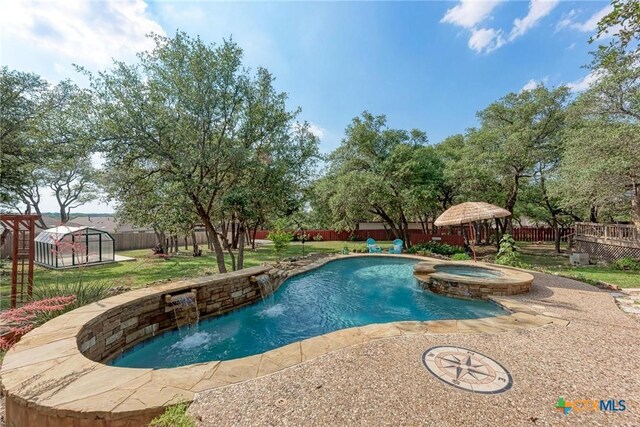 133 Ridgewood Cv, Georgetown, TX 78633 - view of swimming pool with a pool with connected hot tub and a patio