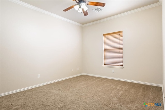 unfurnished room with ceiling fan, carpet flooring, and crown molding