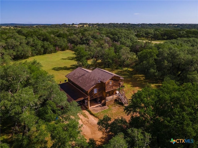1398 Lazy Frst, New Braunfels, TX 78132 - aerial view of property and surrounding area with a forest