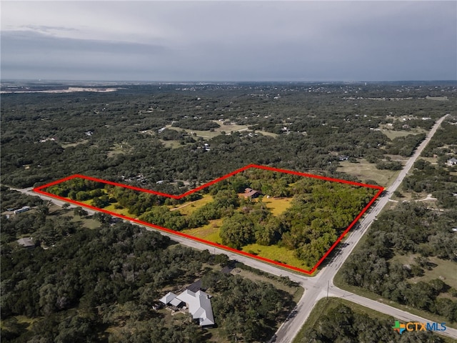 1398 Lazy Frst, New Braunfels, TX 78132 - aerial view of property's location with property parcel outlined and a forest