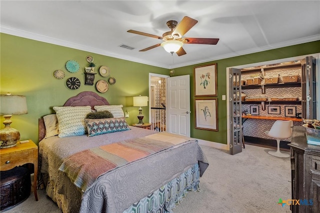 6115 Country Club Dr, Victoria, TX 77904 - bedroom with carpet flooring, ornamental molding, and ceiling fan