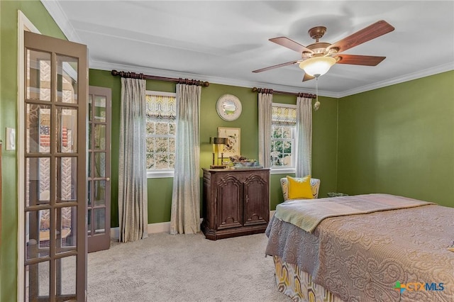 6115 Country Club Dr, Victoria, TX 77904 - bedroom with carpet, ornamental molding, baseboards, and a ceiling fan