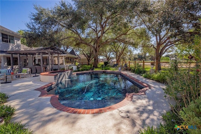 6115 Country Club Dr, Victoria, TX 77904 - view of pool with a pergola, a patio, a pool with connected hot tub, and fence