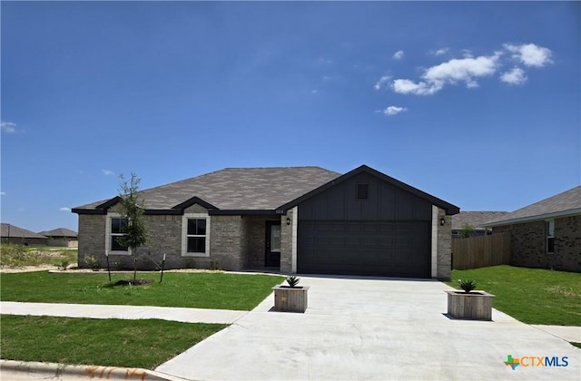 3104 Goblin Dr, Killeen, TX 76549 - ranch-style home with a garage, board and batten siding, and driveway