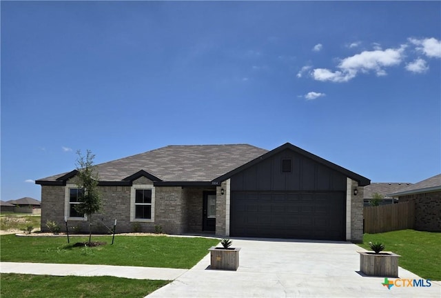 3104 Goblin Dr, Killeen, TX 76549 - single story home with an attached garage, concrete driveway, and board and batten siding