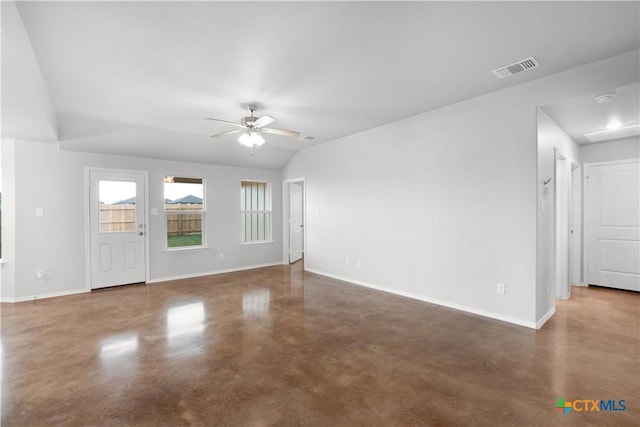 unfurnished living room featuring finished concrete flooring, ceiling fan, baseboards, and visible vents