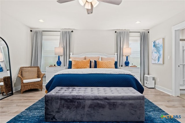 bedroom with ceiling fan, baseboards, wood finished floors, and recessed lighting