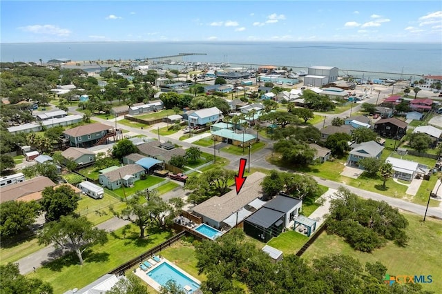 aerial view with a water view and a residential view