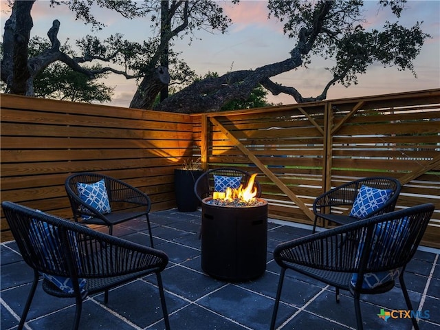 exterior space featuring an outdoor fire pit