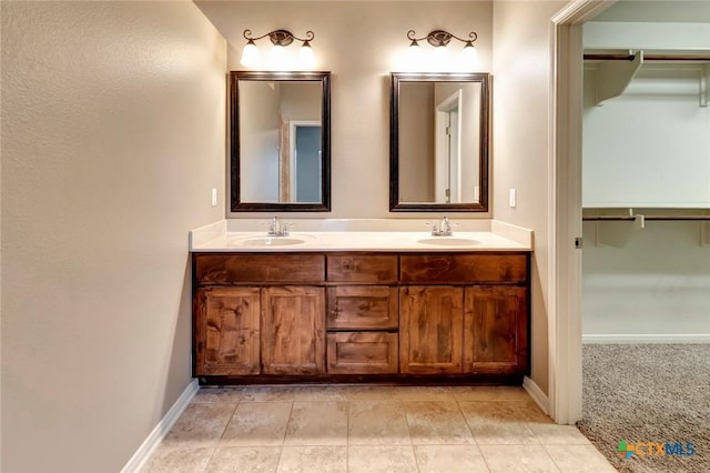 bathroom featuring tile patterned floors and vanity