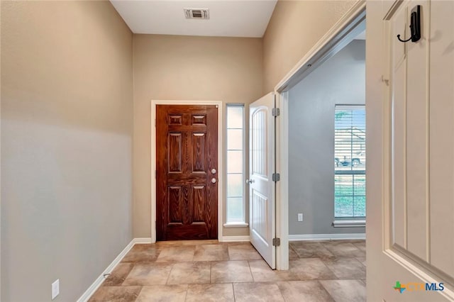 foyer with plenty of natural light