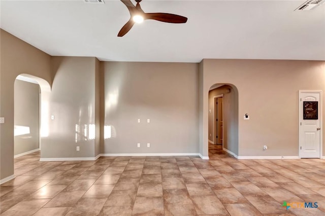 spare room with ceiling fan