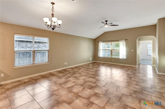 unfurnished room with light tile patterned floors, ceiling fan with notable chandelier, and vaulted ceiling