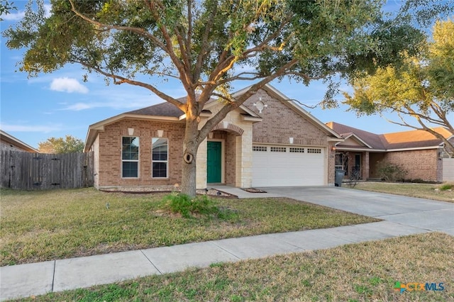 single story home with a garage and a front yard