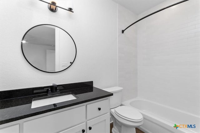 full bathroom featuring bathtub / shower combination, toilet, and vanity