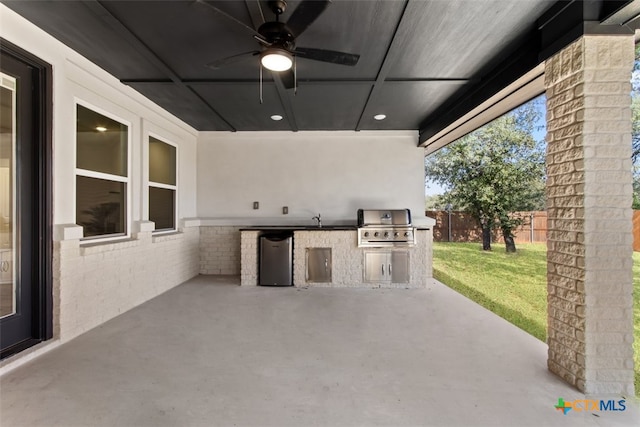 4113 Turning Leaf Dr, Nolanville, TX 76559 - view of patio with an outdoor kitchen, ceiling fan, and grilling area