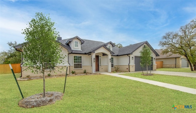 4113 Turning Leaf Dr, Nolanville, TX 76559 - view of front of property with driveway, an attached garage, brick siding, a chimney, and roof with shingles