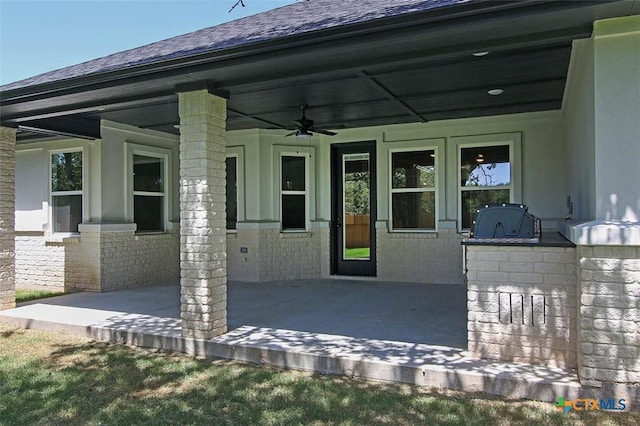 property entrance with area for grilling, a patio, and ceiling fan