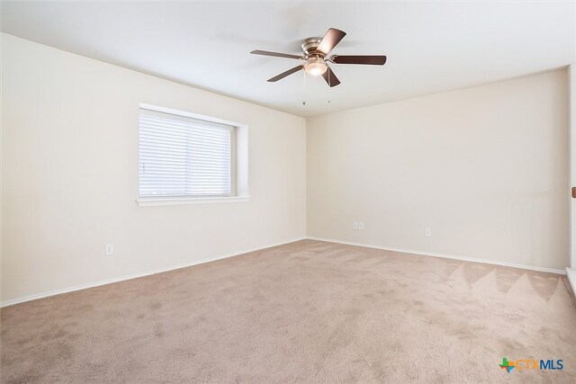 6231 Ambrose Cir, Temple, TX 76502 - spare room with light colored carpet and a ceiling fan