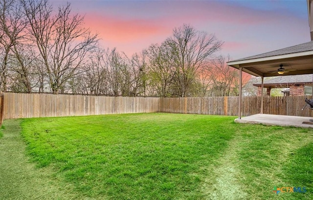 6231 Ambrose Cir, Temple, TX 76502 - fenced backyard featuring ceiling fan and a patio area