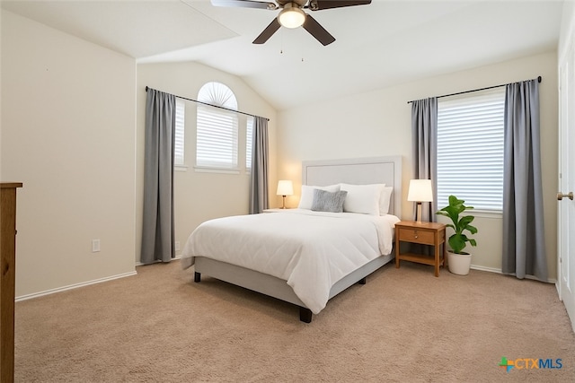 6231 Ambrose Cir, Temple, TX 76502 - bedroom with multiple windows, vaulted ceiling, light colored carpet, and a ceiling fan