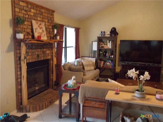 tiled living area with vaulted ceiling and a fireplace