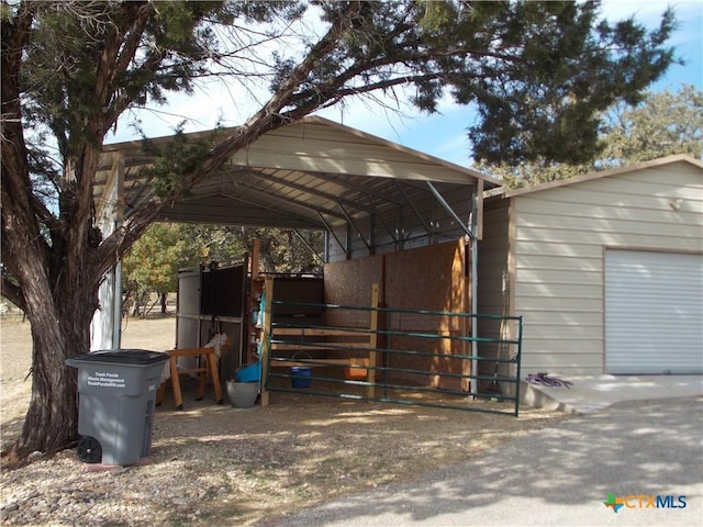 exterior space featuring a carport