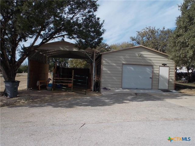 garage with a carport