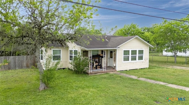 704 Maple St, Yoakum, TX 77995 - view of front facade featuring covered porch