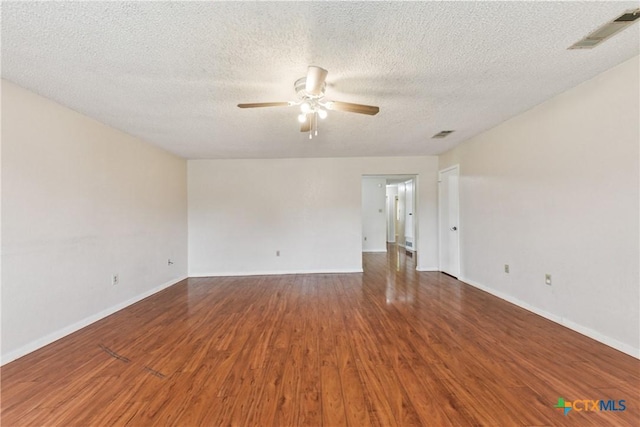 2601 Traverse Dr, Killeen, TX 76543 - spare room with a ceiling fan, wood finished floors, and a textured ceiling