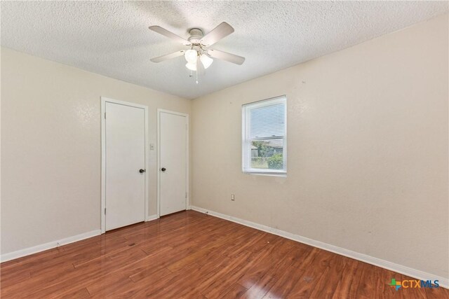 2601 Traverse Dr, Killeen, TX 76543 - spare room featuring wood finished floors, a ceiling fan, and a textured ceiling