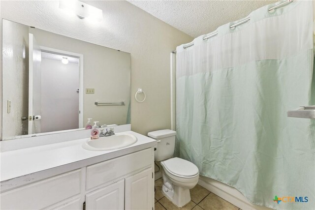 2601 Traverse Dr, Killeen, TX 76543 - bathroom featuring a textured ceiling, tile patterned floors, and vanity