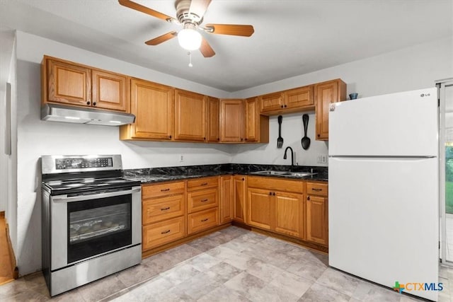 1102 S 5th St, Copperas Cove, TX 76522 - kitchen featuring freestanding refrigerator, electric stove, under cabinet range hood, a ceiling fan, and dark stone countertops