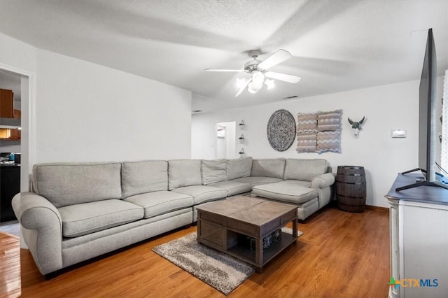 1102 S 5th St, Copperas Cove, TX 76522 - living area featuring a ceiling fan and wood finished floors