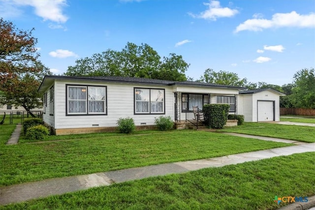 1102 S 5th St, Copperas Cove, TX 76522 - view of front facade featuring crawl space, a garage, and concrete driveway