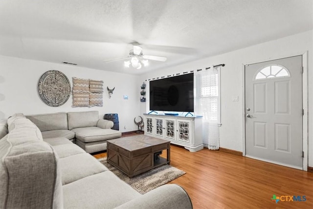 1102 S 5th St, Copperas Cove, TX 76522 - living area with light wood-style flooring and a ceiling fan