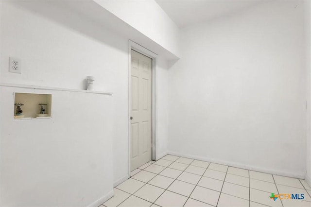 1102 S 5th St, Copperas Cove, TX 76522 - washroom featuring hookup for a washing machine and baseboards
