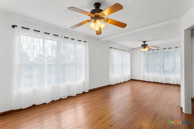 1102 S 5th St, Copperas Cove, TX 76522 - unfurnished room with healthy amount of natural light, wood finished floors, and ceiling fan
