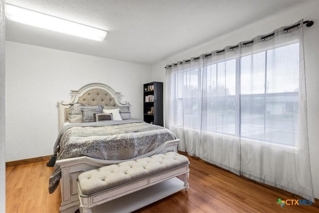 1102 S 5th St, Copperas Cove, TX 76522 - bedroom with wood finished floors and baseboards