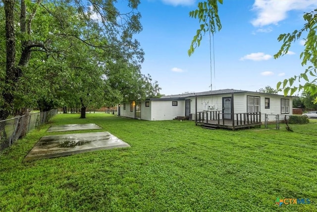 1102 S 5th St, Copperas Cove, TX 76522 - back of house with a fenced backyard, a wooden deck, and a patio area
