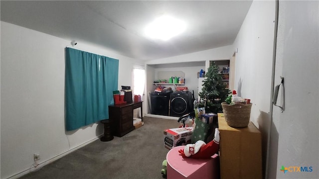 miscellaneous room with separate washer and dryer, carpet floors, and vaulted ceiling