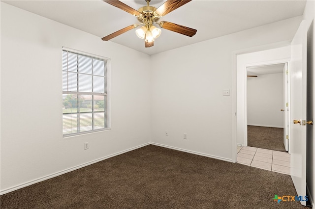 3908 Fieldcrest Dr, Killeen, TX 76549 - carpeted empty room with ceiling fan and tile patterned floors
