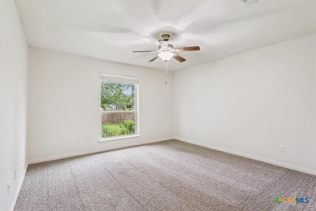 3306 Spring Canyon Rd, Belton, TX 76513 - spare room with baseboards, a ceiling fan, and carpet