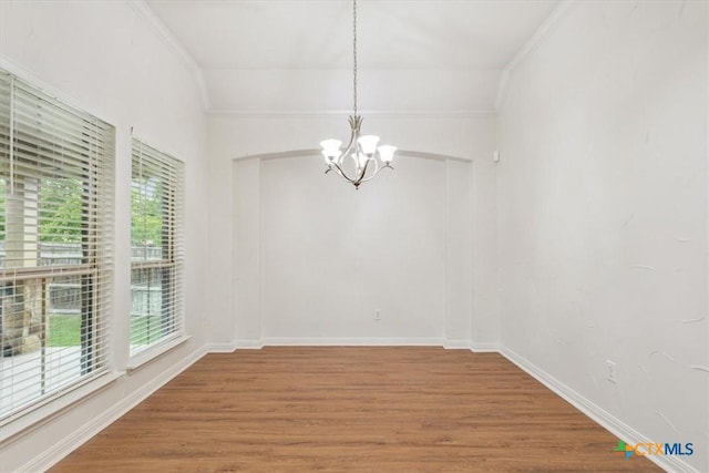 3306 Spring Canyon Rd, Belton, TX 76513 - unfurnished dining area featuring baseboards, wood finished floors, and a notable chandelier