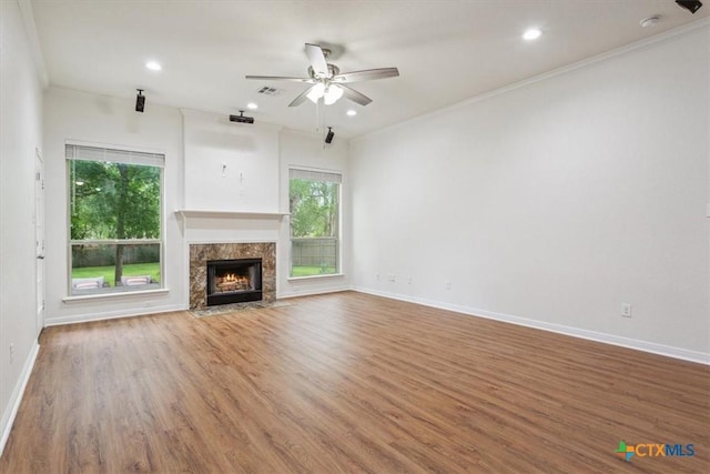 3306 Spring Canyon Rd, Belton, TX 76513 - unfurnished living room with baseboards, a ceiling fan, a wealth of natural light, and visible vents