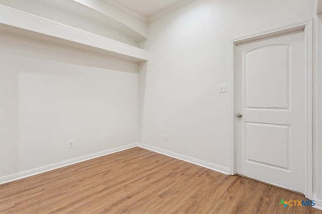 3306 Spring Canyon Rd, Belton, TX 76513 - empty room featuring crown molding, baseboards, and light wood-style flooring