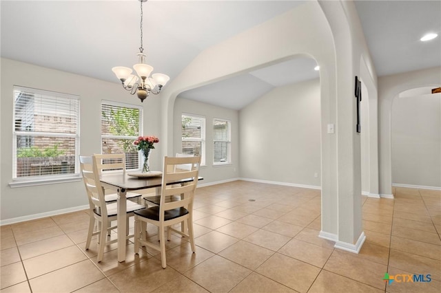 101 Payne Stewart Dr, Round Rock, TX 78664 - dining space featuring arched walkways, vaulted ceiling, light tile patterned floors, a chandelier, and recessed lighting