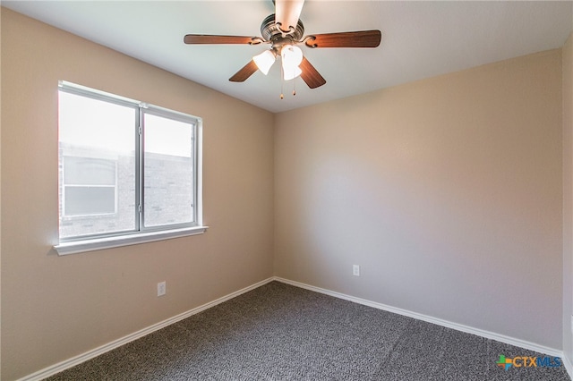 unfurnished room with carpet and ceiling fan