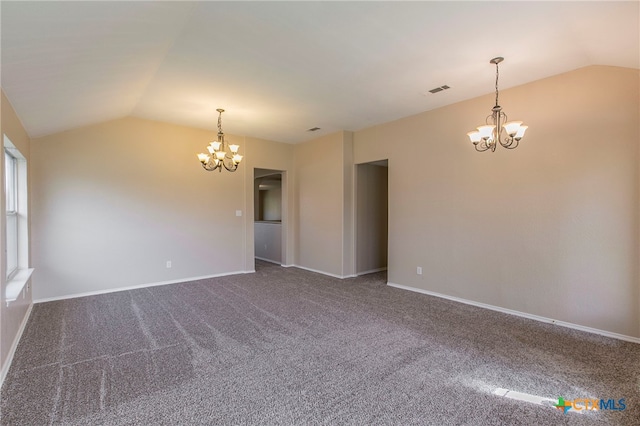 unfurnished room featuring lofted ceiling, dark colored carpet, and a notable chandelier