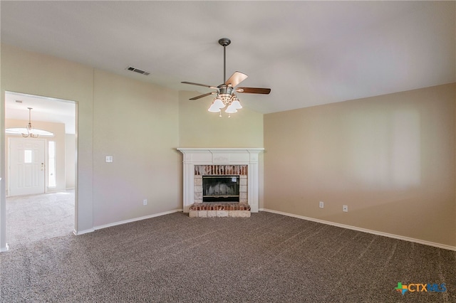 unfurnished living room with carpet flooring, a fireplace, and ceiling fan